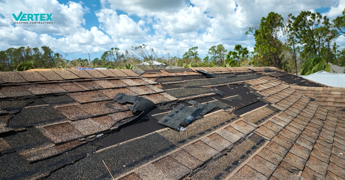 Storm damaged residential roof from abov